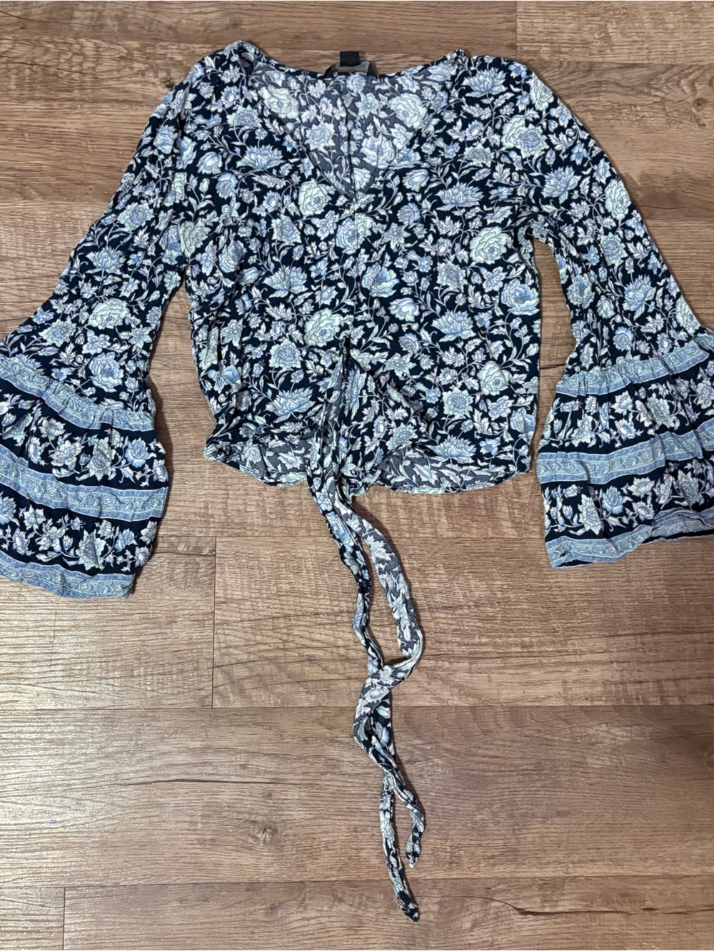 white/black floral print blouse with bell sleeves